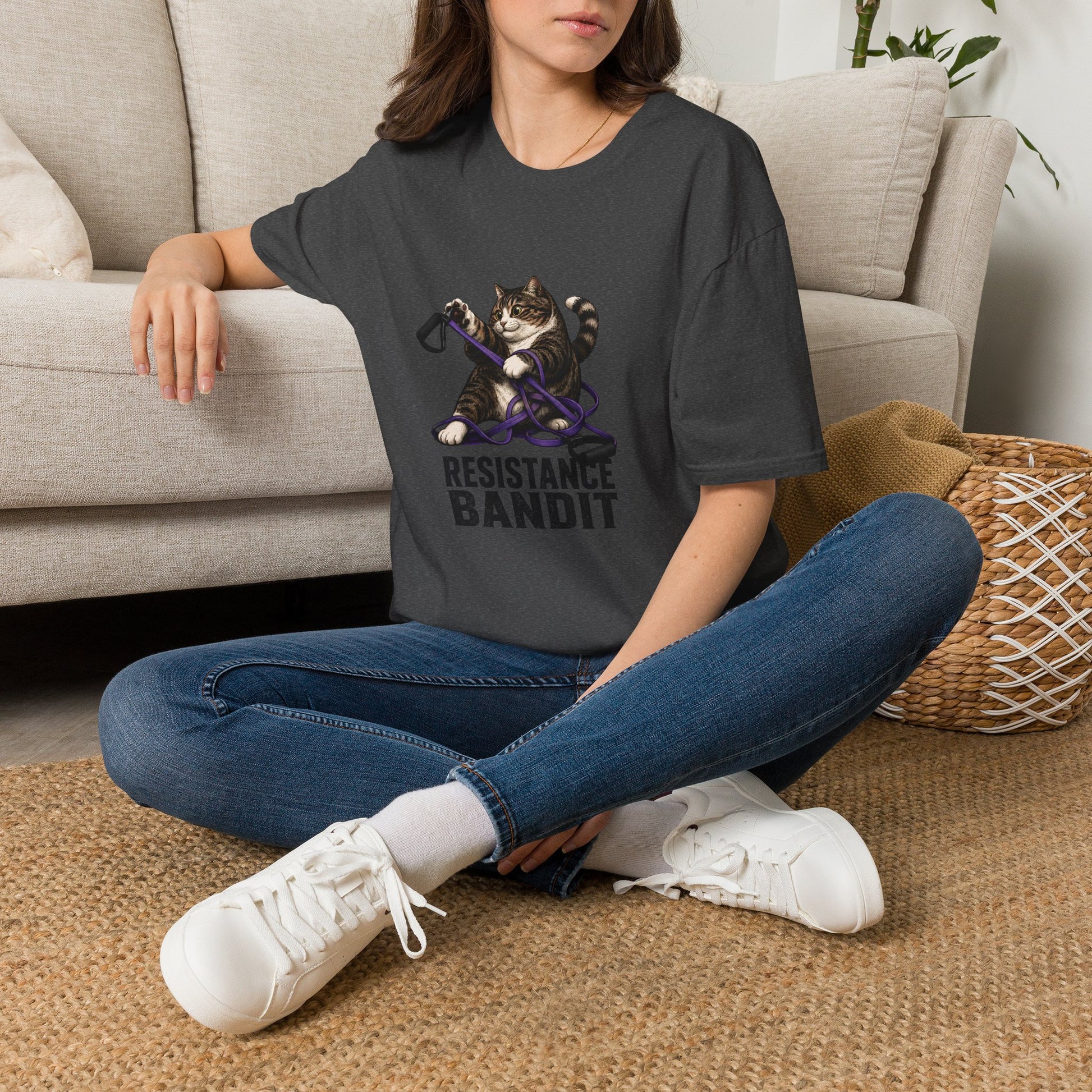 Resistance Bandit cat t-shirt, mischievous cat exercising with resistance bands design, dark heather